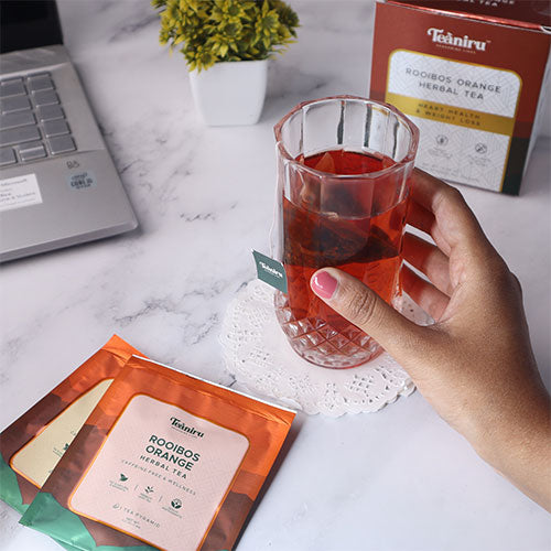 Working while enjoying Rooibos Orange Herbal Tea Kit is pure bliss.